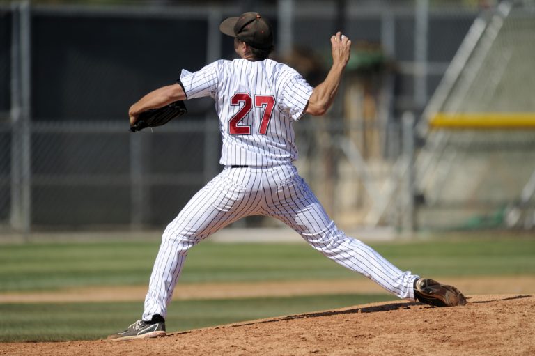 Baseball pitcher throwing the ball A baseball pitcher throws during a baseball game.