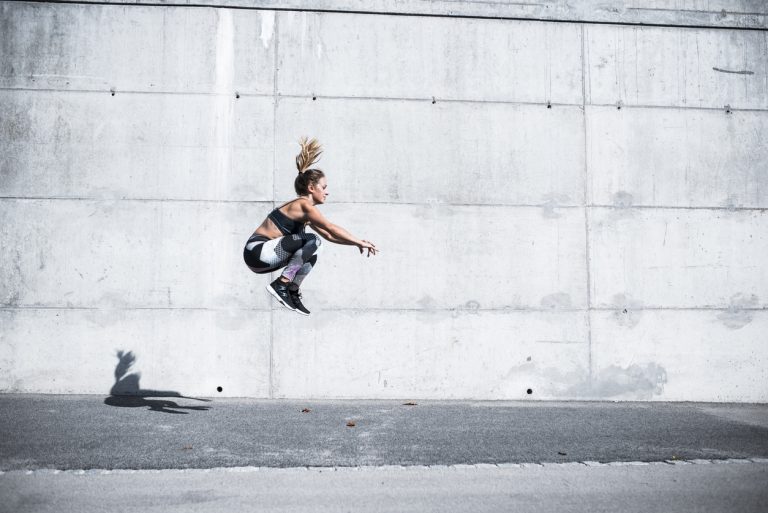 High in the sky A young woman working out