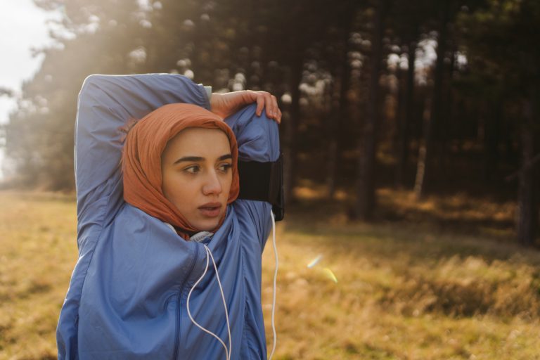 Sporty woman with a hijab Portrait of a young woman with a hijab ready to do some sports