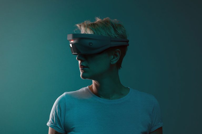 Virtual Reality Device Young woman is using VR device. Studio shot with lot of copy space.