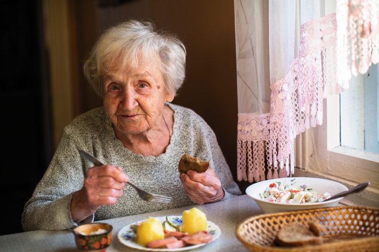 Elderly russian woman portrait dines in his home. Elderly russian woman portrait dines in his home.