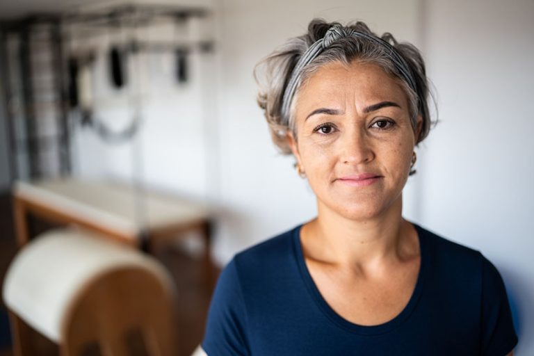 Portrait of a mature woman at a pilates studio Portrait of a mature woman at a pilates studio