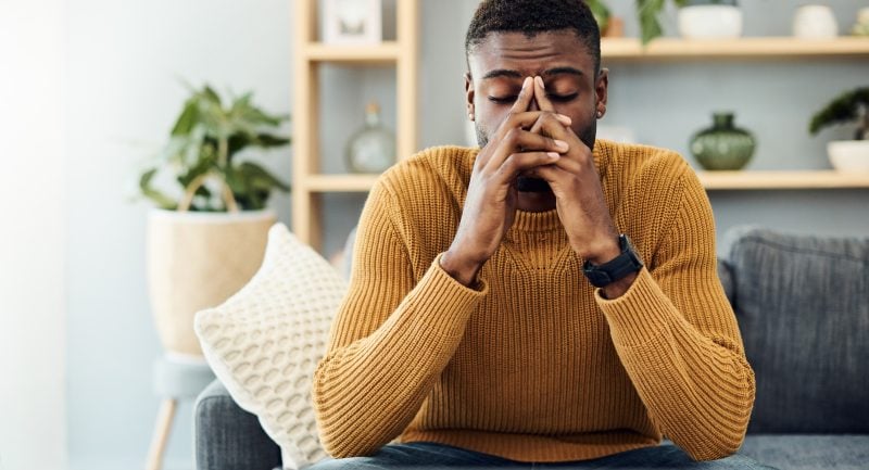 I need to find a way to cope with this stress Shot of a young man looking stressed out at home